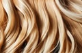 Close-up of beautiful long wavy hairs. Strands of Beautiful long curly hairs. Beauty, Fashion, Hairdresser salon concept. Perfect