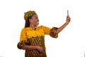 close up of beautiful mature business woman making video call using mobile phone , happy Royalty Free Stock Photo