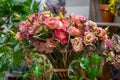 Close-up of beautiful multi-colored bouquet of mixed roses in flower shop. Fresh cut flowers