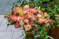 Close-up of beautiful multi-colored bouquet of mixed roses in flower shop. Fresh cut flowers