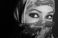 Close-up beautiful mysterious eyes eastern woman wearing a hijab. black and white Royalty Free Stock Photo