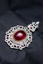 Silver handmade pendant with giant ruby Royalty Free Stock Photo
