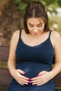 Close up of beautiful pregnant woman. Happy lady smile and rejoiced