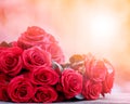 close up beautiful red roses bouguet with glowing light background for valentine day and love theme