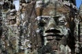 Smiling stone face at east gate of Bayon Temple in Cambodia Royalty Free Stock Photo