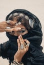 Close up of beautiful tribal woman. Hands of ethnic dancer. Soft Royalty Free Stock Photo