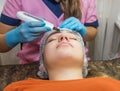 Close-up Of Beautiful Woman Receiving Ultrasound Cavitation Facial Peeling. Ultrasonic Skin Cleansing Procedure. Beauty Treatment Royalty Free Stock Photo
