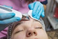 Close-up Of Beautiful Woman Receiving Ultrasound Cavitation Facial Peeling. Ultrasonic Skin Cleansing Procedure. Beauty Treatment Royalty Free Stock Photo