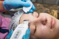 Close-up Of Beautiful Woman Receiving Ultrasound Cavitation Facial Peeling. Ultrasonic Skin Cleansing Procedure. Beauty Treatment Royalty Free Stock Photo