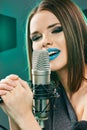 Close up beautiful woman singer portrait. Royalty Free Stock Photo