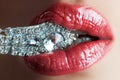 Close-up of beautiful womans lips with bright fashion dark red glossy makeup. Macro lipgloss cherry make-up. Mouth with Royalty Free Stock Photo