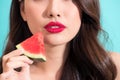 Close-up of a beautiful women holding watermelon slice with red Royalty Free Stock Photo