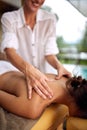 Close up of woman receiving back massage at salon spa Royalty Free Stock Photo