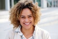 Close up beautiful young african american woman smiling outside Royalty Free Stock Photo