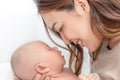 Close up beautiful young asian mother holding her newborn one month baby sleep on herlap. Healthcare and medical.  Lovely asia Royalty Free Stock Photo