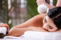 Close up beautiful young asian woman lying relaxing in the spa salon massage Royalty Free Stock Photo
