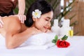 Close up beautiful young asian woman lying relaxing in the spa salon massage, health and body care concept Royalty Free Stock Photo