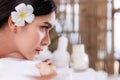 Close up beautiful young asian woman lying relaxing in the spa salon massage Royalty Free Stock Photo