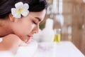 Close up beautiful young asian woman lying relaxing in the spa salon massage Royalty Free Stock Photo