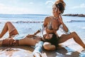 Close up of beautiful young couple having fun at the beach Royalty Free Stock Photo