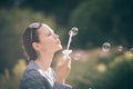 Close up. beautiful young woman blowing bubbles Royalty Free Stock Photo