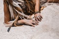 Close up of beautiful young woman in boho style bikini lying on sand at the beach Royalty Free Stock Photo