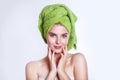 Close-up of beautiful young woman with green bath towel Royalty Free Stock Photo