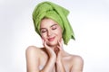 Close-up of beautiful young woman with green bath towel Royalty Free Stock Photo