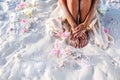 Close up of beautiful young  woman legs on the beach at sunset Royalty Free Stock Photo