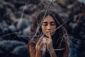 Close up of beautiful young woman outdoors. witch craft concept