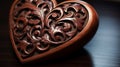 A close-up of a beautifully carved wooden heart, with intricate details and a rich, polished finish