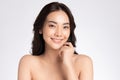 Close up Beauty face. Smiling asian woman touching healthy skin portrait. Beautiful happy girl model with fresh glowing hydrated Royalty Free Stock Photo