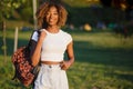 Close up beauty outdoor portrait of attractive charming young african-american smiling woman with natural make up and afro hair, Royalty Free Stock Photo