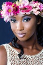 Face shot of young african bride with floral crown. Royalty Free Stock Photo