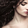 Close up beauty portrait of curly hair young woman natural beauty concept studio shot