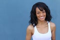 Close up beauty portrait of a young and attractive African American black woman with perfect skin, softly smiling Royalty Free Stock Photo