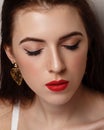 Close-up beauty portrait of young woman with beautiful bright makeup. Modern smokey eyes with colorful eyeshadows Royalty Free Stock Photo