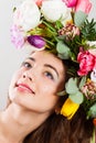 Spring Woman with flowers hairstyle and rainbow make up Royalty Free Stock Photo