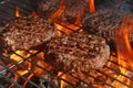 Beef burger for hamburger on barbecue flame grill Royalty Free Stock Photo