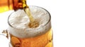 Close-Up Of Beer Being Poured Into A Glass Mug, Creating A Frothy Head And Bubbles Royalty Free Stock Photo