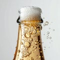 Close Up of Beer Bottle with Bubbles and Foam on Light Background Royalty Free Stock Photo
