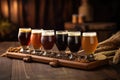 close-up of beer flight on rustic wooden table