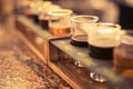 Close up of beer flights on granite bar top with selective focus