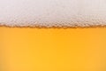 Close up of beer with foam. Royalty Free Stock Photo