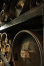 Close-up of beer kegs on shelf