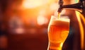 Close up of beer tap pouring a draught lager beer Royalty Free Stock Photo