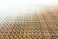 Close-up of beige fabric plastic lattice, grid texture pattern