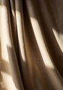Elegant Beige Linen Curtain Drapery Texture with Dramatic Sunlight Shadow Folds Background Royalty Free Stock Photo
