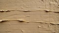 Close up of beige textured material with horizontal lines and torn edges creating a pattern Royalty Free Stock Photo