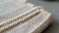 Close-up of beige woven textile with intricate yarn patterns Royalty Free Stock Photo